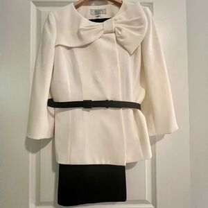 Tahari Pantsuit-Cream Jacket with Black Belt, Bow Collar and black pant.